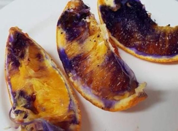 Учёные определили причину изменения цвета апельсина из-за свежезаточенного ножа